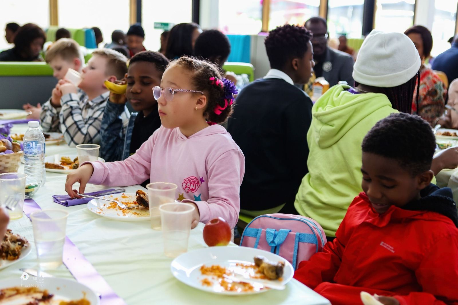 Children sharing a meal together at the conference